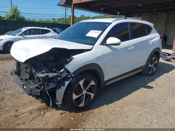 KM8J3CA25HU330276 2017 HYUNDAI TUCSON - Image 2