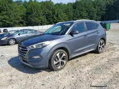 KM8J3CA25HU335980 2017 HYUNDAI TUCSON