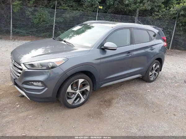 KM8J3CA25HU340886 2017 HYUNDAI TUCSON - Image 2