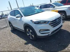 KM8J3CA25HU375380 2017 HYUNDAI TUCSON