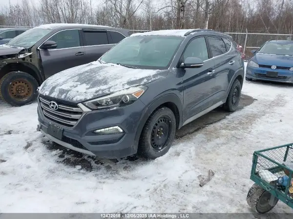 KM8J3CA25HU377341 2017 HYUNDAI TUCSON - Image 2