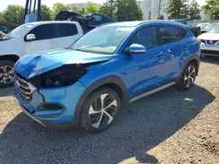 KM8J3CA25HU391787 2017 HYUNDAI TUCSON