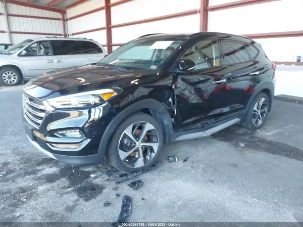 KM8J3CA25HU404912 2017 HYUNDAI TUCSON - Image 2