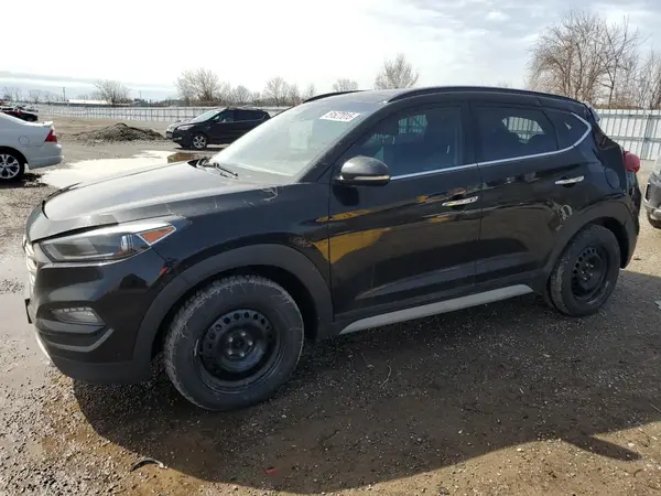 KM8J3CA25HU434850 2017 HYUNDAI TUCSON - Image 1
