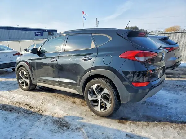 KM8J3CA25HU460705 2017 HYUNDAI TUCSON - Image 2