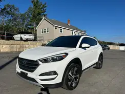 KM8J3CA25HU565373 2017 HYUNDAI TUCSON