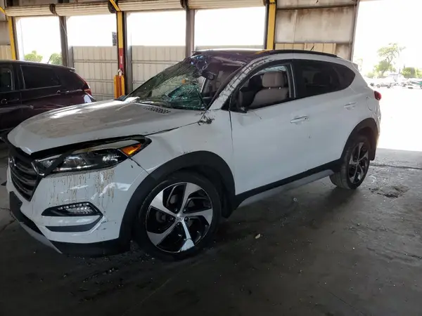 KM8J3CA25HU567091 2017 HYUNDAI TUCSON - Image 1