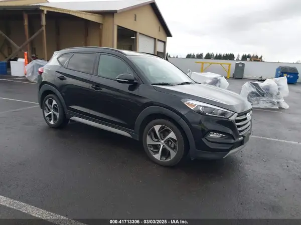 KM8J3CA25HU571660 2017 HYUNDAI TUCSON - Image 1