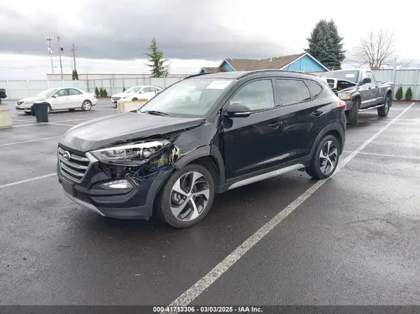 KM8J3CA25HU571660 2017 HYUNDAI TUCSON - Image 2