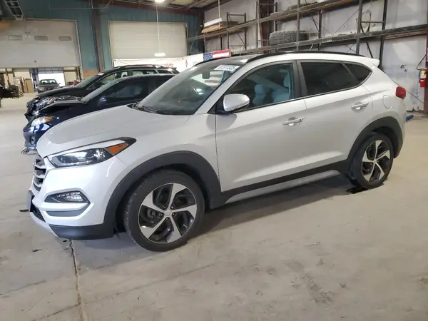 KM8J3CA25JU800165 2018 HYUNDAI TUCSON - Image 1