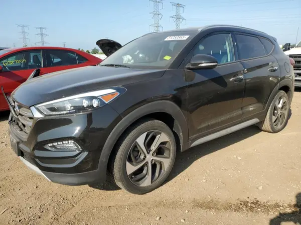 KM8J3CA25JU830606 2018 HYUNDAI TUCSON - Image 1