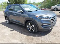 KM8J3CA26GU033662 2016 HYUNDAI TUCSON
