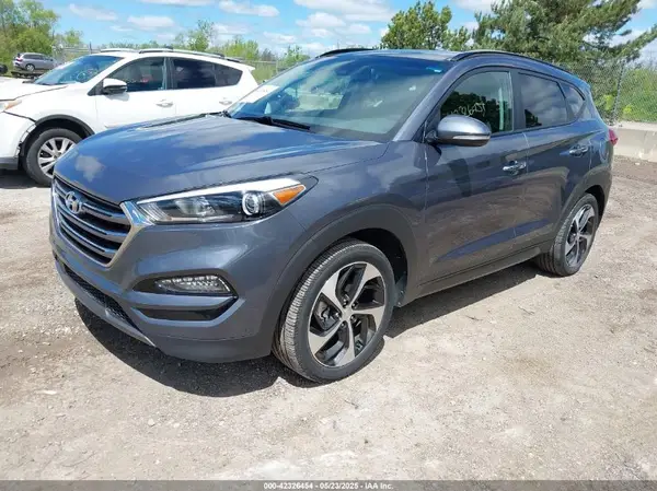 KM8J3CA26GU033662 2016 HYUNDAI TUCSON - Image 2