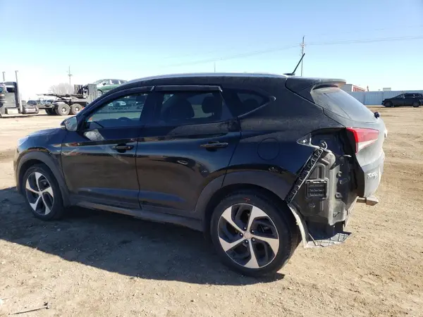 KM8J3CA26GU052423 2016 HYUNDAI TUCSON - Image 2