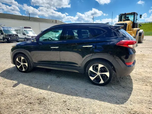 KM8J3CA26GU057802 2016 HYUNDAI TUCSON - Image 2