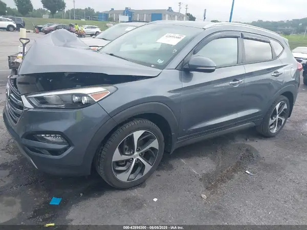 KM8J3CA26GU081002 2016 HYUNDAI TUCSON - Image 2