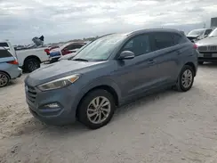 KM8J3CA26GU107615 2016 HYUNDAI TUCSON