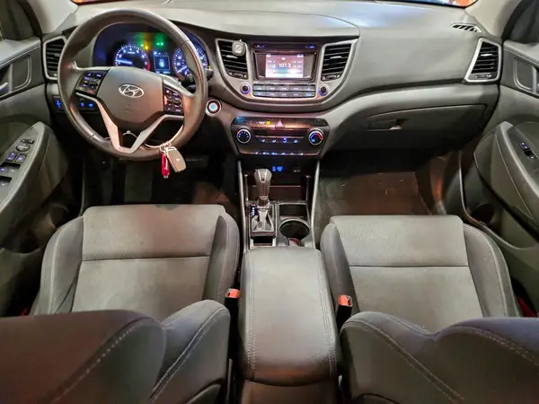 KM8J3CA26GU121174 2016 HYUNDAI TUCSON - Image 8