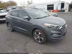 KM8J3CA26GU122406 2016 HYUNDAI TUCSON