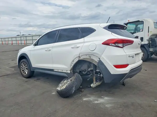 KM8J3CA26GU123507 2016 HYUNDAI TUCSON - Image 2