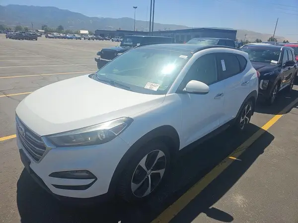 KM8J3CA26GU125385 2016 HYUNDAI TUCSON - Image 2