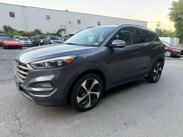 KM8J3CA26GU147340 2016 HYUNDAI TUCSON - Image 2