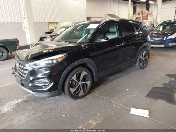 KM8J3CA26GU190284 2016 HYUNDAI TUCSON - Image 2