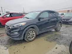 KM8J3CA26GU202997 2016 HYUNDAI TUCSON