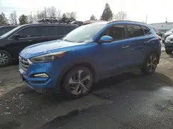 KM8J3CA26GU229990 2016 HYUNDAI TUCSON