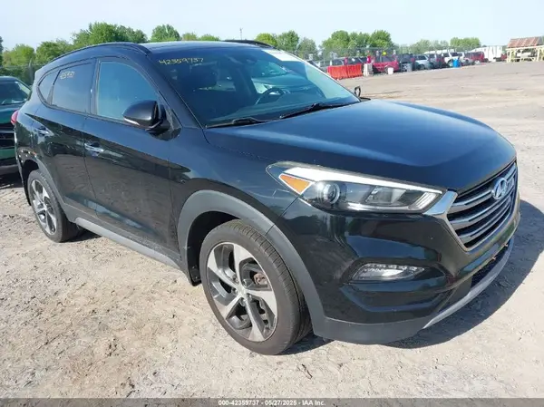 KM8J3CA26HU283291 2017 HYUNDAI TUCSON - Image 1