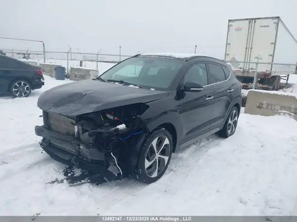 KM8J3CA26HU430693 2017 HYUNDAI TUCSON - Image 2