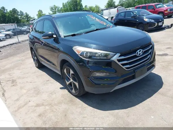 KM8J3CA26HU571389 2017 HYUNDAI TUCSON - Image 1