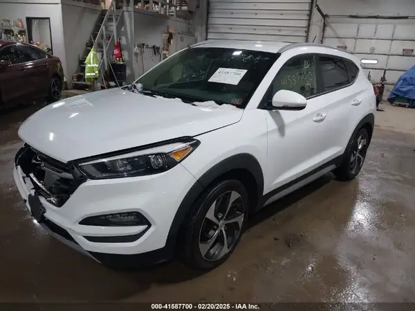 KM8J3CA26HU584580 2017 HYUNDAI TUCSON - Image 2
