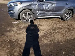KM8J3CA26JU628521 2018 HYUNDAI TUCSON