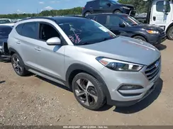 KM8J3CA26JU697712 2018 HYUNDAI TUCSON