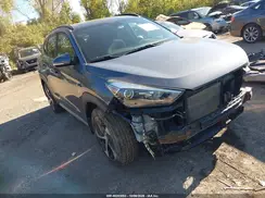 KM8J3CA26JU716890 2018 HYUNDAI TUCSON