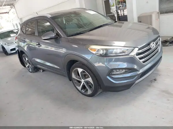 KM8J3CA27GU042144 2016 HYUNDAI TUCSON - Image 1