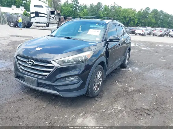 KM8J3CA27GU060868 2016 HYUNDAI TUCSON - Image 2