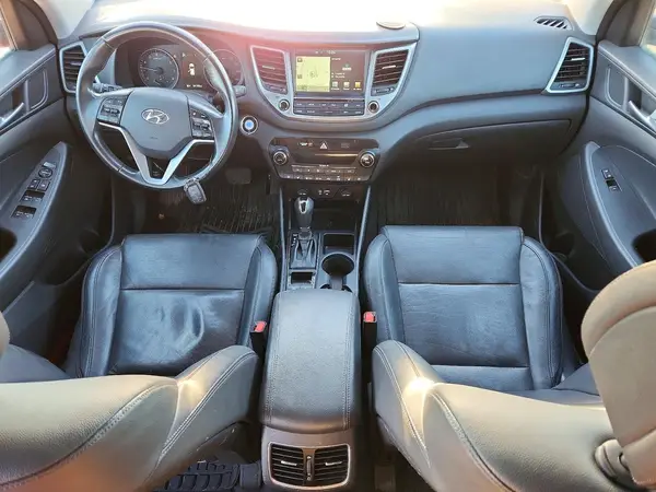 KM8J3CA27GU098021 2016 HYUNDAI TUCSON - Image 8