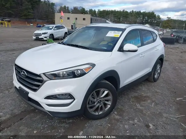 KM8J3CA27GU123600 2016 HYUNDAI TUCSON - Image 2