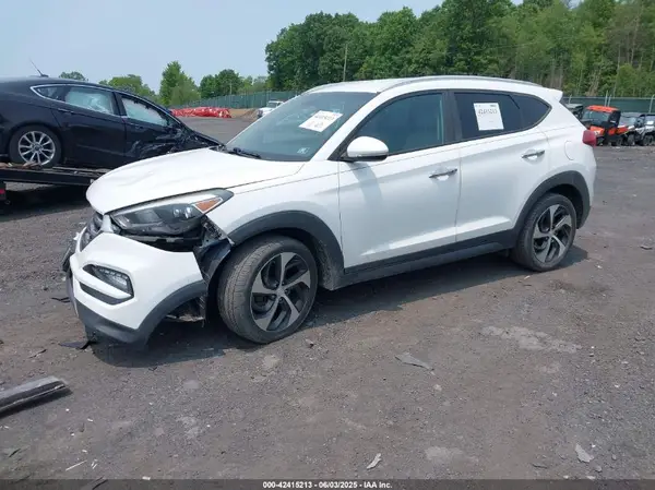 KM8J3CA27GU142714 2016 HYUNDAI TUCSON - Image 2