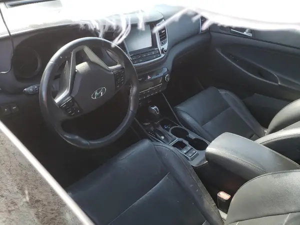 KM8J3CA27GU185496 2016 HYUNDAI TUCSON - Image 8