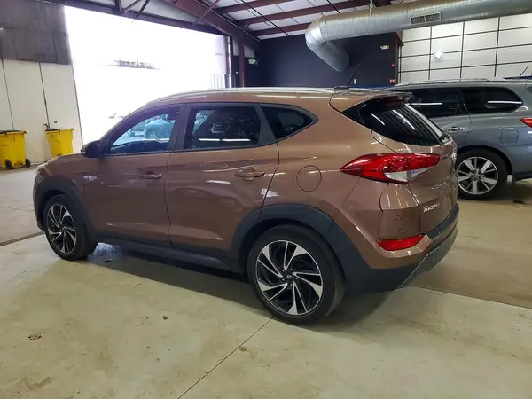KM8J3CA27GU232946 2016 HYUNDAI TUCSON - Image 2