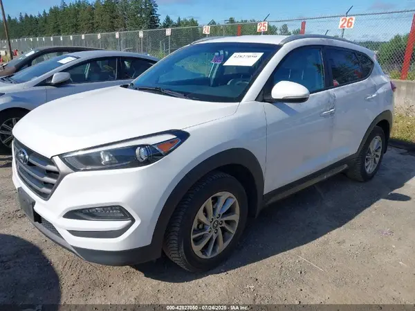 KM8J3CA27GU236222 2016 HYUNDAI TUCSON - Image 2