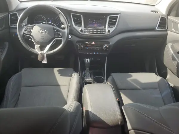KM8J3CA27GU242263 2016 HYUNDAI TUCSON - Image 8