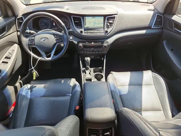 KM8J3CA27GU260259 2016 HYUNDAI TUCSON - Image 8
