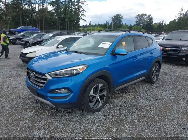 KM8J3CA27HU335740 2017 HYUNDAI TUCSON - Image 2