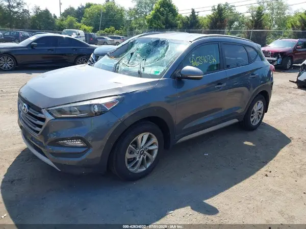 KM8J3CA27HU341005 2017 HYUNDAI TUCSON - Image 2