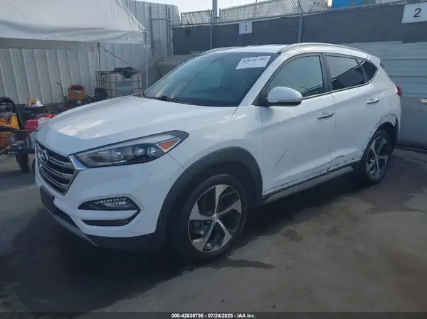 KM8J3CA27HU370603 2017 HYUNDAI TUCSON - Image 2