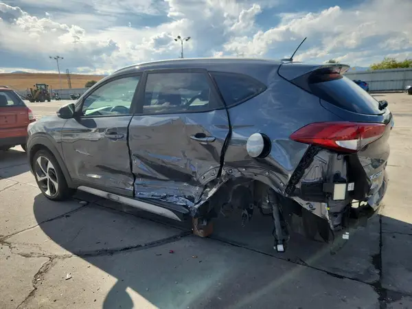 KM8J3CA27HU421310 2017 HYUNDAI TUCSON - Image 2
